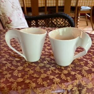 Elegant White Ceramic Mugs Pair